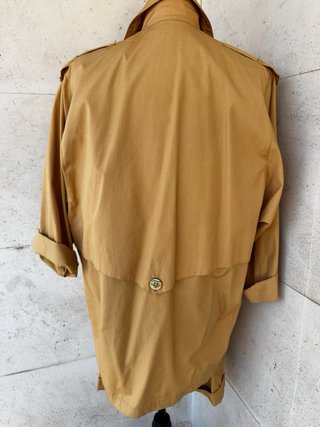 Conjunto falda pantalón y chaqueta camel