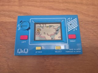 Q&Q Penguin Land Juego LCD