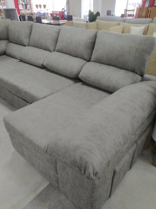 Divano letto grigio con pouf