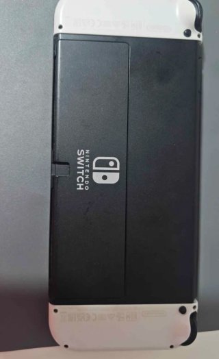 Nintendo Switch OLED + Mando Pro + 5 Juegos