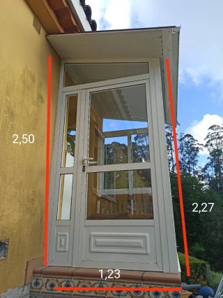 Ventanas correderas y puerta con fijos