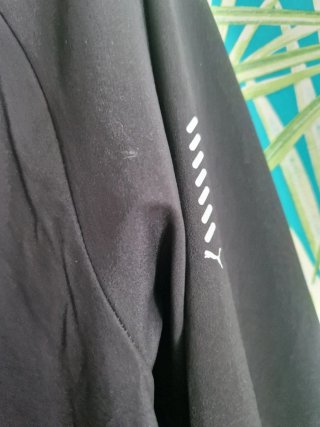 Cortavientos Puma Negro con Capucha