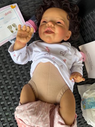 Bambola reborn con accessori corpo in tessuto