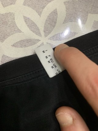 Abito Moschino nero con logo oro