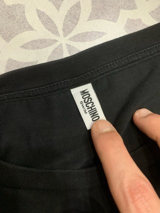 Abito Moschino nero con logo oro