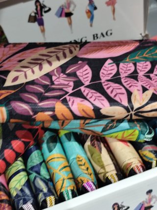 Bolso de mano con estampado floral (x unidad)