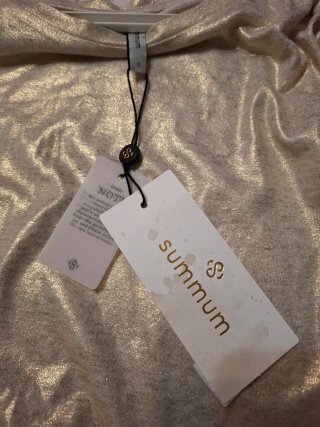 Camiseta dorada Summum