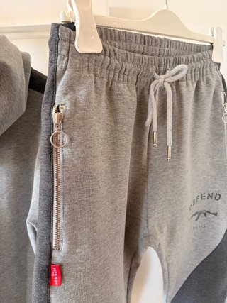 Tuta uomo grigia con zip