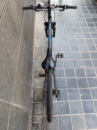 Bicicleta Rockrider ST100 Gris con candados