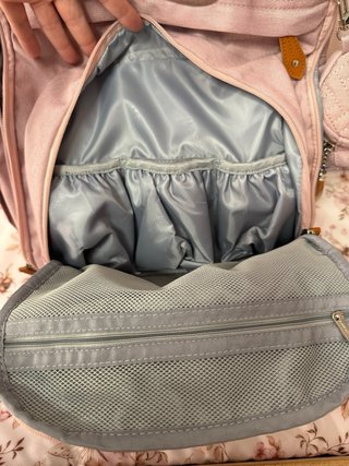 Mochila bebé para carro color rosa