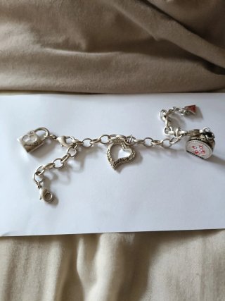 Pulsera Guess Corazón Candado y Monedero