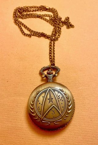 Cartel Star Trek + Reloj de bolsillo Star Trek