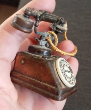Sacapuntas teléfono metal vintage Playme años 70