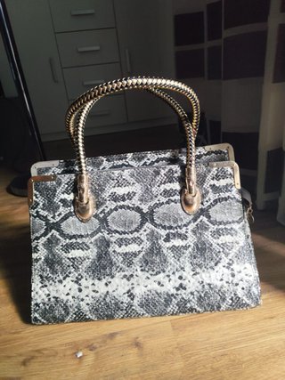Bolso estampado serpiente