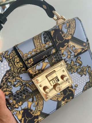 Bolso estampado barroco dorado