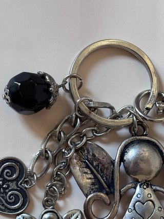 Adorno metálico para bolso
