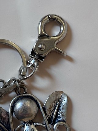 Adorno metálico para bolso