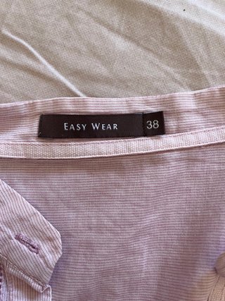 Camisa larga rosa con detalles