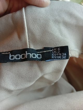 Chaqueta manga corta con pantalón corto incorporad