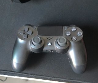 Mando PS4 Rojo y Gris.
