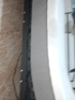 Cama articulada gris y blanca