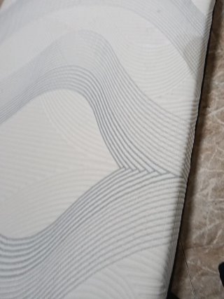 Cama articulada gris y blanca