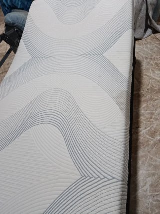 Cama articulada gris y blanca
