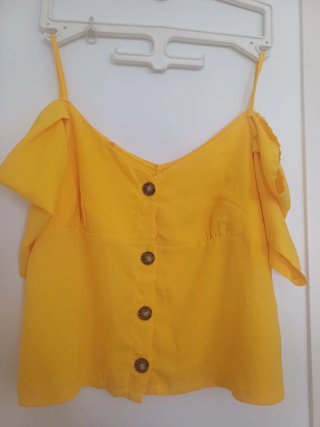 Blusa juvenil amarilla manga corta