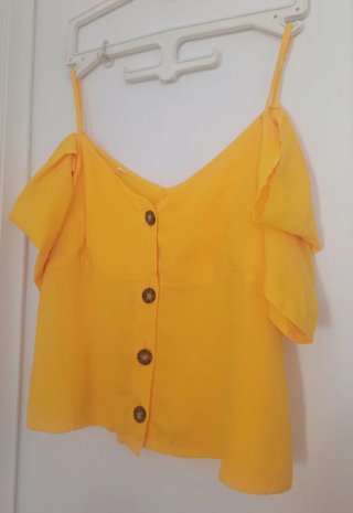 Blusa juvenil amarilla manga corta