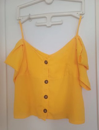 Blusa juvenil amarilla manga corta