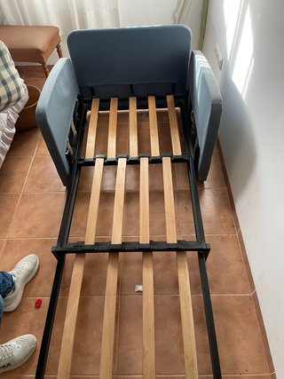 Divano letto in tessuto beige e blu a quadri