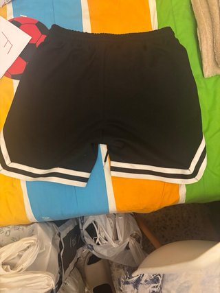Pantalones de chándal negros con ángeles