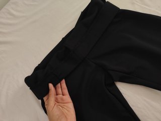 Pantalones flare negros acampanados
