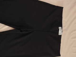 Pantalones flare negros acampanados