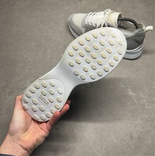 Zapatillas Dior grises y blancas