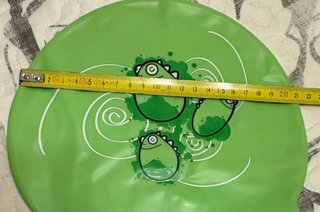 Gorro de natación verde con dinosaurios