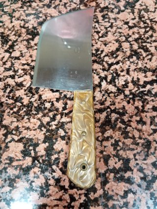 Hacha antigua con mango de nacar