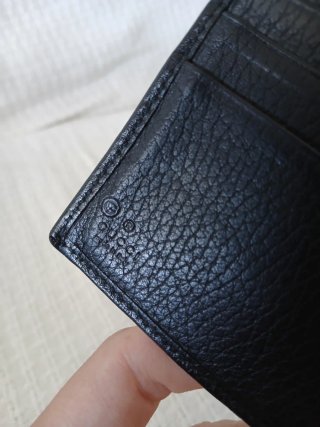 Gucci men's leather bifold wallet — barely used