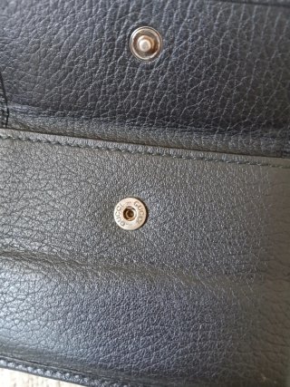 Gucci men's leather bifold wallet — barely used