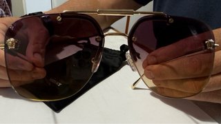 Occhiali da sole Versace dorati e viola