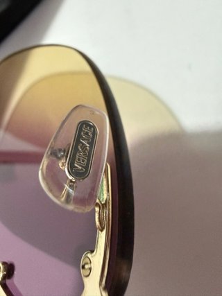 Occhiali da sole Versace dorati e viola