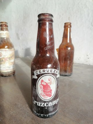 Lotto di 5 bottigliette antiche Cruzcampo e San Miguel