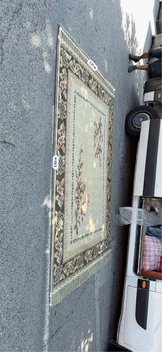 Alfombra de tela y lana beige y rosa