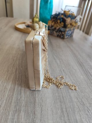 Bolso de fiesta satén dorado champán