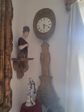 Reloj de péndulo antiguo dorado