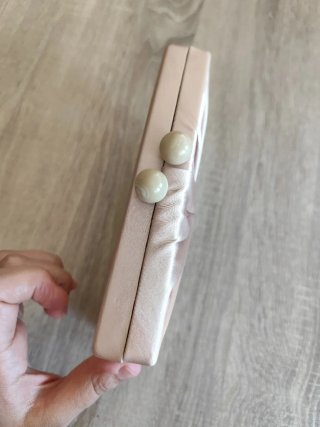 Bolso de satén rosa oro