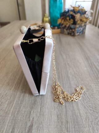 Bolso de satén rosa oro