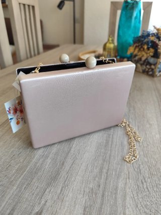 Bolso de satén rosa oro