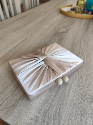 Bolso de satén rosa oro