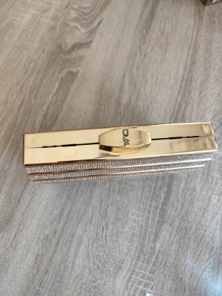 Bolso de fiesta metalizado con piedras